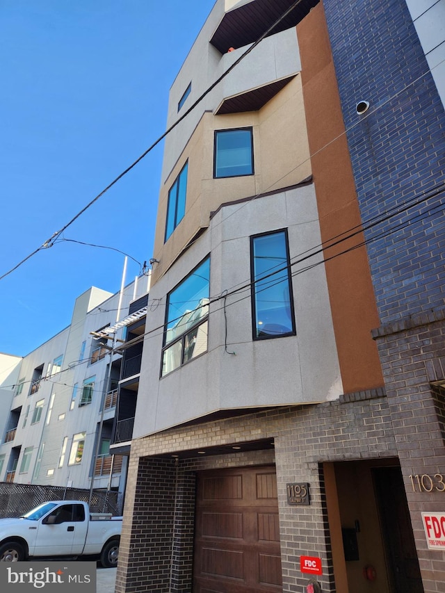 view of building exterior with a garage