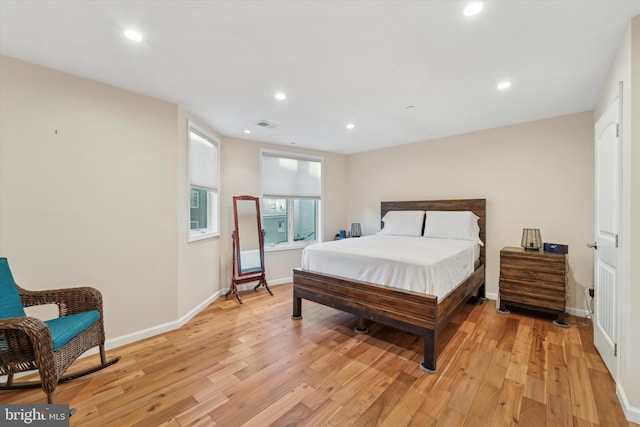 bedroom with light wood-type flooring