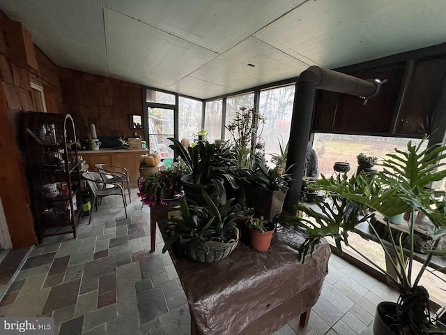 sunroom / solarium with lofted ceiling