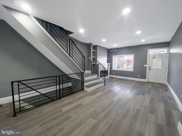 entrance foyer with hardwood / wood-style floors