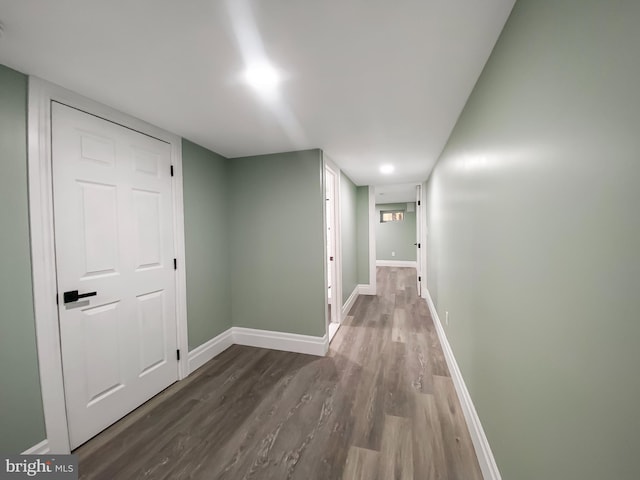 hall featuring dark wood-type flooring