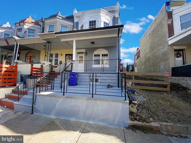 view of property featuring a porch