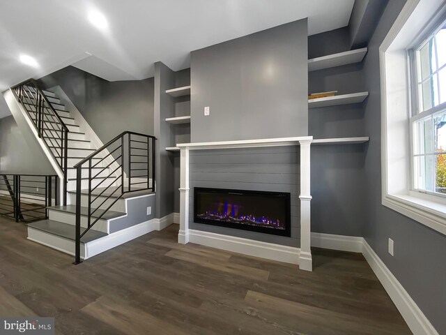 4827 N Warnock St, Philadelphia, PA 19141 - unfurnished living room featuring wood finished floors and stairs