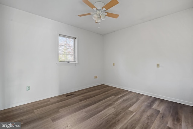 unfurnished room with hardwood / wood-style flooring and ceiling fan