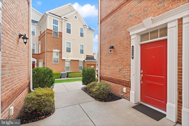 doorway to property with cooling unit