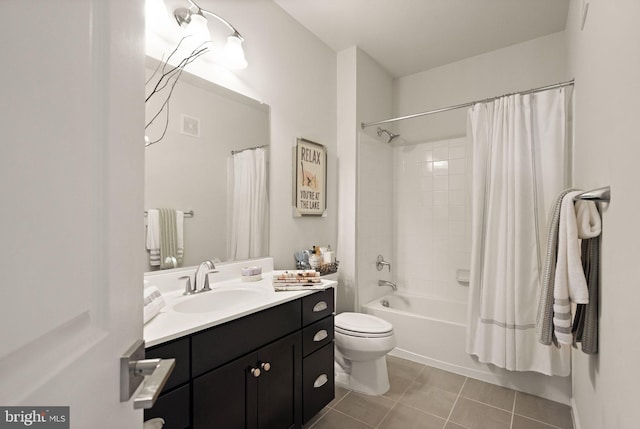 full bathroom with tile patterned floors, vanity, shower / bath combination with curtain, and toilet