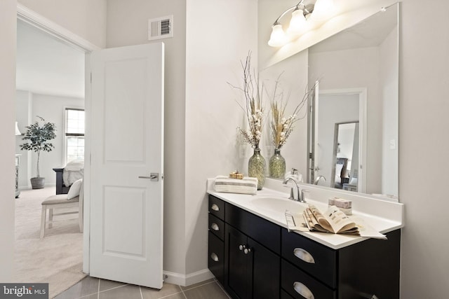 bathroom with vanity and tile patterned floors