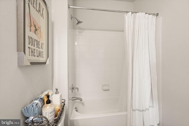 bathroom featuring shower / bath combination with curtain