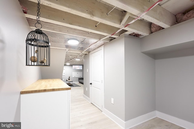 hall with light wood-type flooring