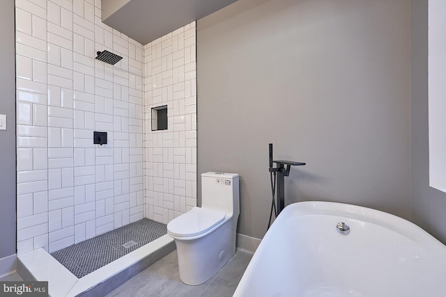 bathroom with toilet and separate shower and tub