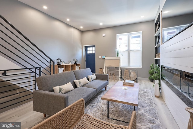 living room with light hardwood / wood-style floors