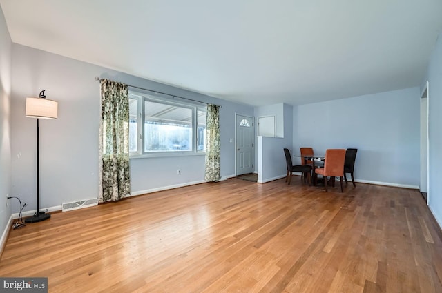 interior space with hardwood / wood-style flooring