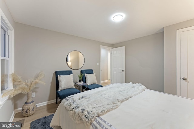 bedroom featuring light wood-type flooring