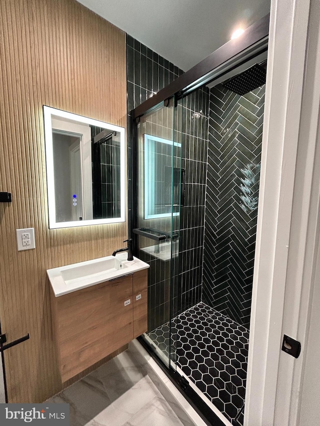 bathroom with vanity and walk in shower