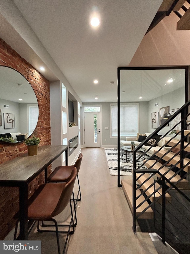 interior space featuring carpet flooring and plenty of natural light