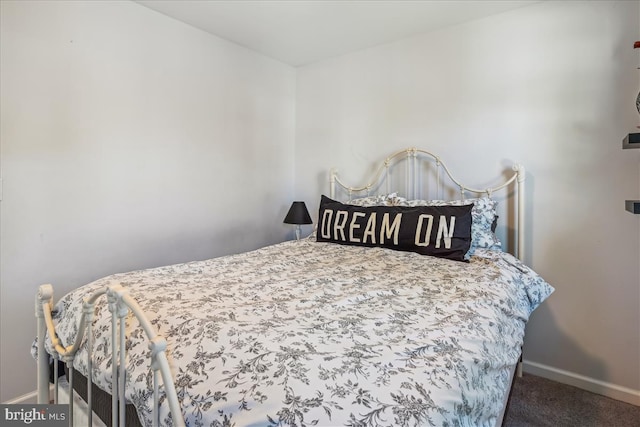 bedroom featuring carpet