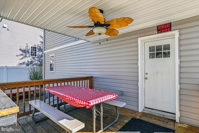 wooden terrace with ceiling fan