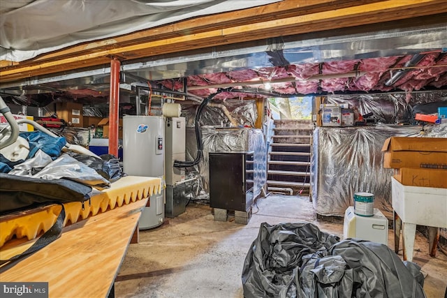 basement featuring electric water heater