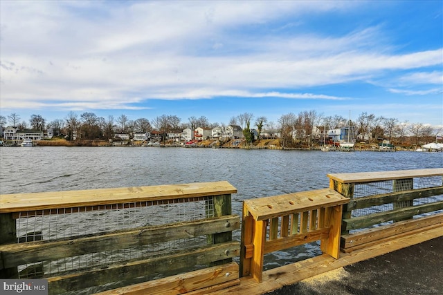 dock area featuring a water view