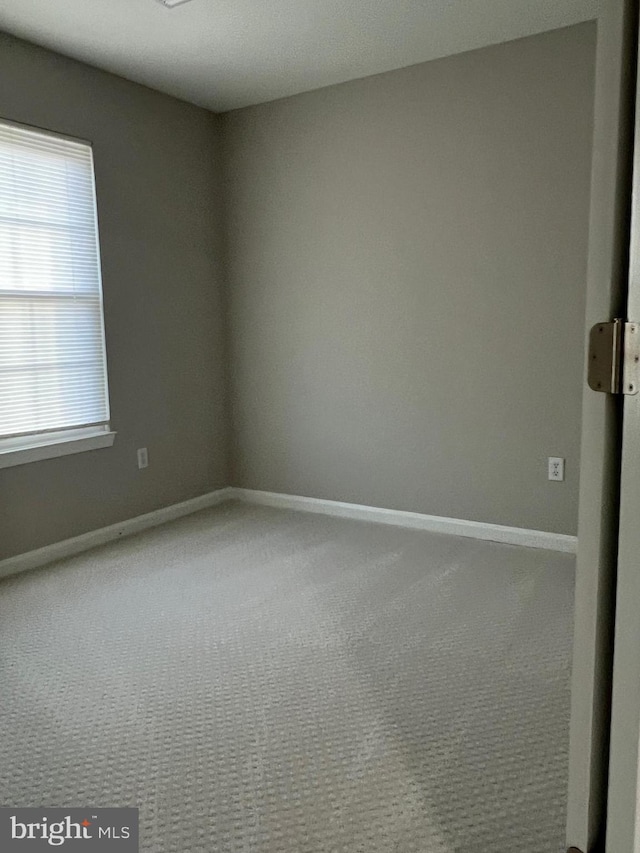 empty room with carpet floors