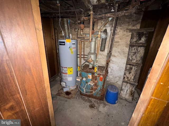 utility room with gas water heater