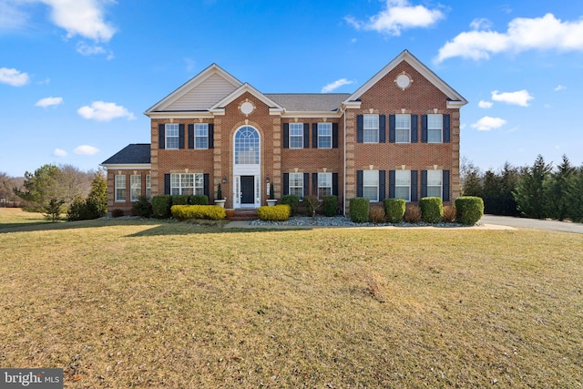 6616 Osborne Hill Dr, Upper Marlboro, MD 20772 - view of front of property with brick siding and a front yard