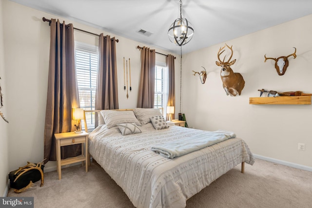 6616 Osborne Hill Dr, Upper Marlboro, MD 20772 - bedroom with carpet floors, a chandelier, and baseboards