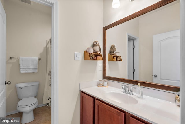 6616 Osborne Hill Dr, Upper Marlboro, MD 20772 - full bathroom with toilet, vanity, and tile patterned floors