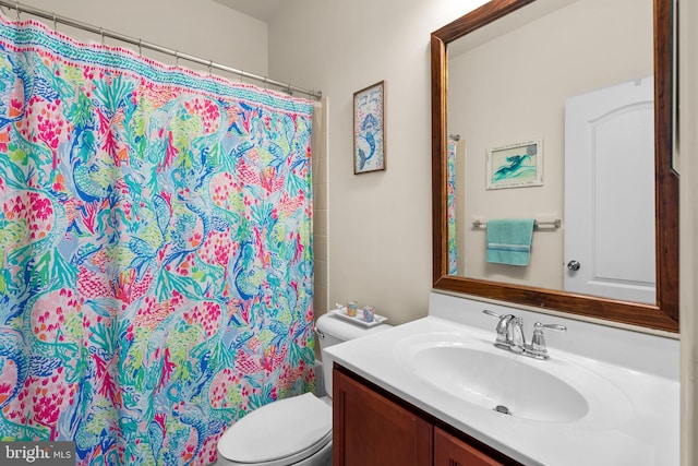 6616 Osborne Hill Dr, Upper Marlboro, MD 20772 - bathroom with vanity, toilet, and curtained shower