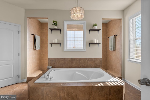 6616 Osborne Hill Dr, Upper Marlboro, MD 20772 - full bathroom featuring a bath, healthy amount of natural light, and tile patterned flooring