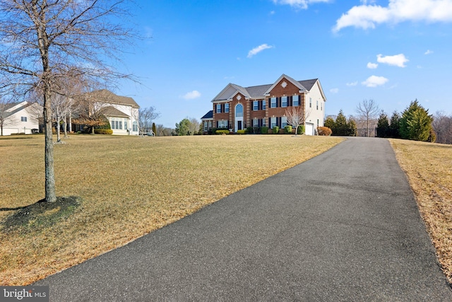 6616 Osborne Hill Dr, Upper Marlboro, MD 20772 - view of front facade with a front yard and asphalt driveway
