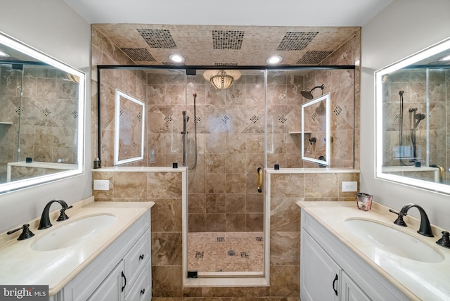 bathroom with vanity and an enclosed shower