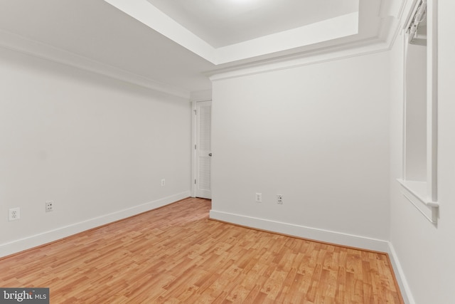 empty room with light hardwood / wood-style floors