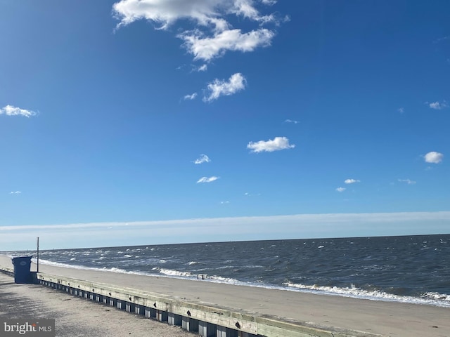 property view of water featuring a beach view