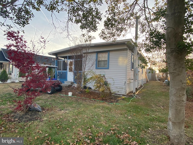 bungalow with a front yard