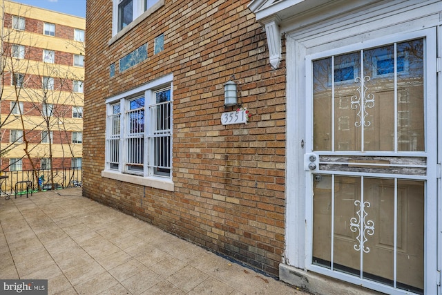 property entrance with a patio