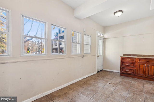 empty room featuring light tile patterned floors