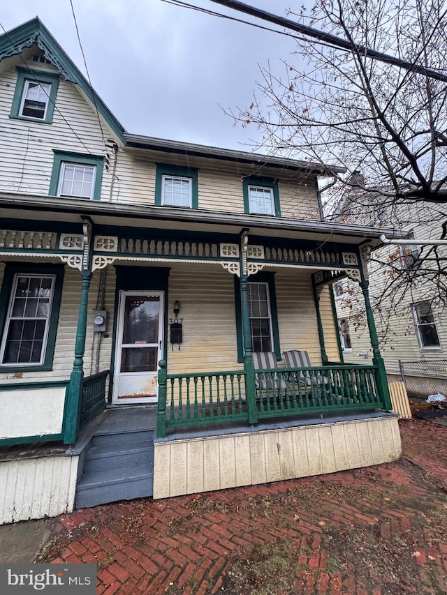 view of front facade featuring covered porch