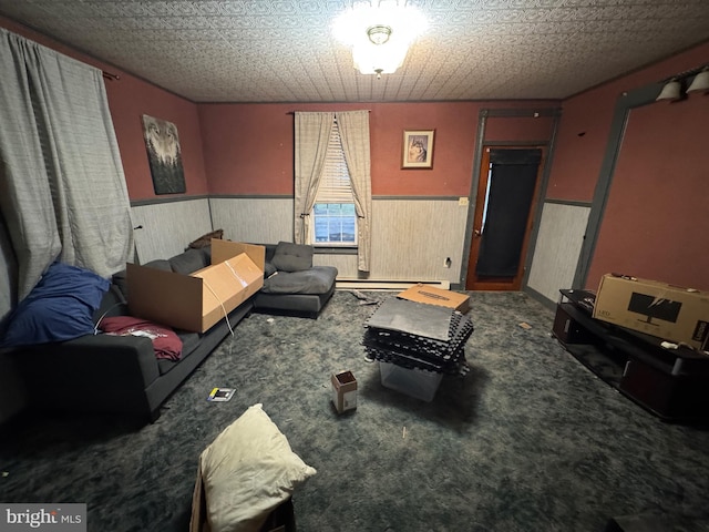 living room featuring carpet flooring and a textured ceiling