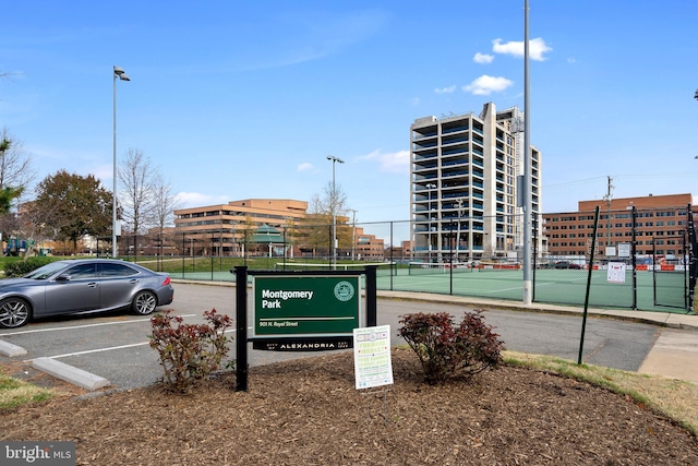 exterior space featuring tennis court