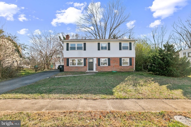 view of front of home with a front yard