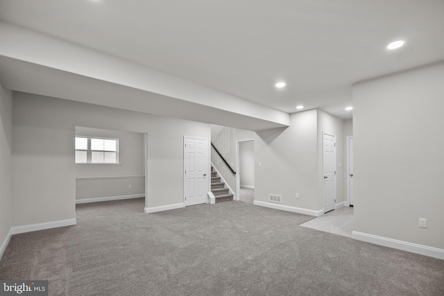 basement with light carpet