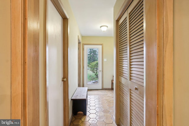 corridor featuring tile patterned floors