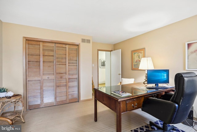 home office featuring light hardwood / wood-style flooring