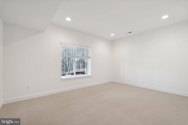 view of carpeted spare room