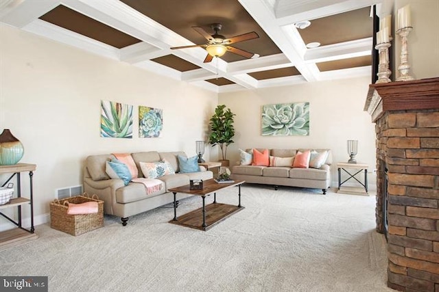 living room featuring beamed ceiling, light carpet, and coffered ceiling