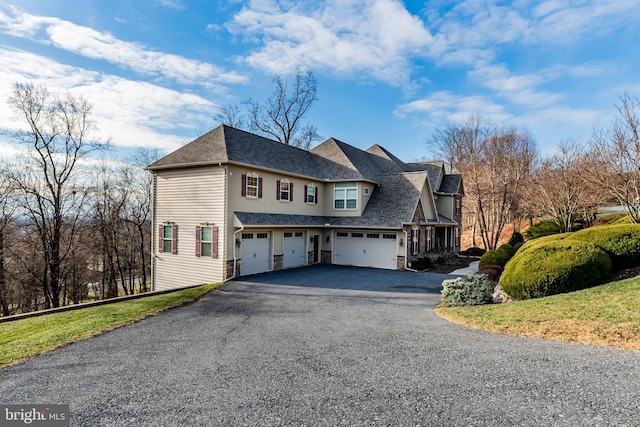 view of front of house with a garage