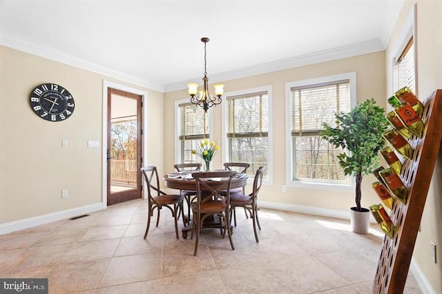 tiled dining space with ornamental molding and an inviting chandelier