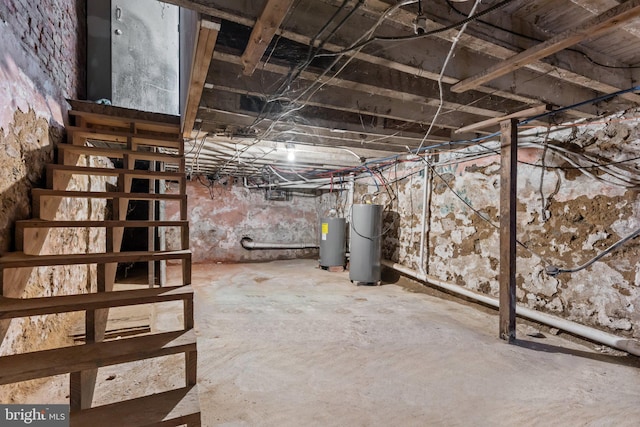 basement with electric water heater and water heater