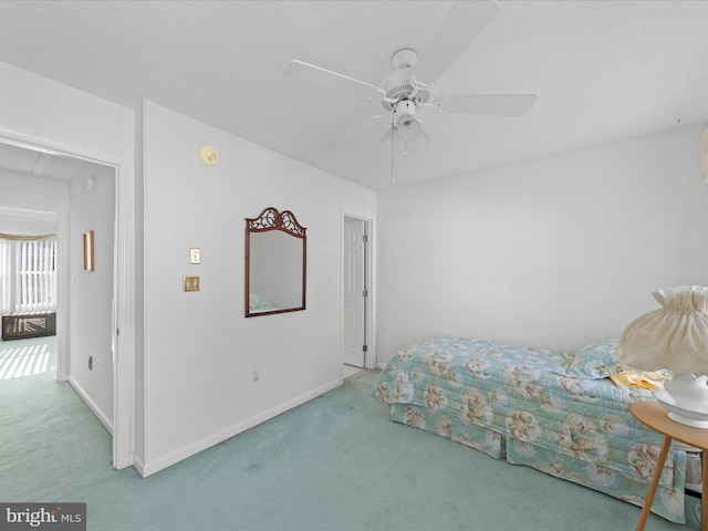 bedroom featuring carpet floors and ceiling fan